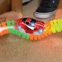 MANVI Magic Tracks – 10 Feet of Glow - in - the - Dark Flexible Race Track with LED Light - Up Race Car, Educational Toy for Kids Ages 3+ - M&M